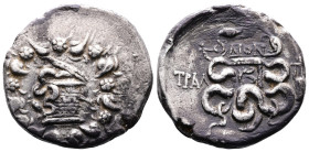 Lydia,Tralleis, circa 140-135 BC. AR Cistophoric Tetradrachm (26 mm, 12,13 g.), struck under the magistrate Dion Cista Mystica from which snake coils;...