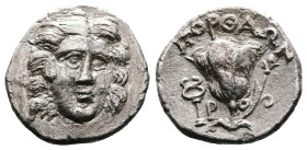 Islands off Caria, Rhodes, circa 205-190 BC. AR Drachm (15mm, 2,57g.). Portaon magistrate. Head of Helios facing slightly to right. Rev. Rose with bud...