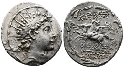 Seleukid Kingdom, Antiochos VI Dionysos, 145-142 BC. AR Tetradrachm (33mm, 16,66g.). Antioch, 144-143 BC. Radiate and diademed head of Antiochos VI ri...
