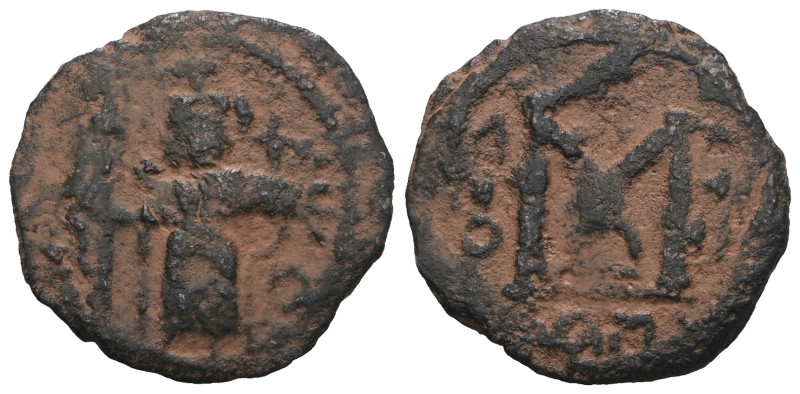 Byzantine bronze coin. Artificial sandpatina. Weight 2,56 gr - Diameter 18 mm.