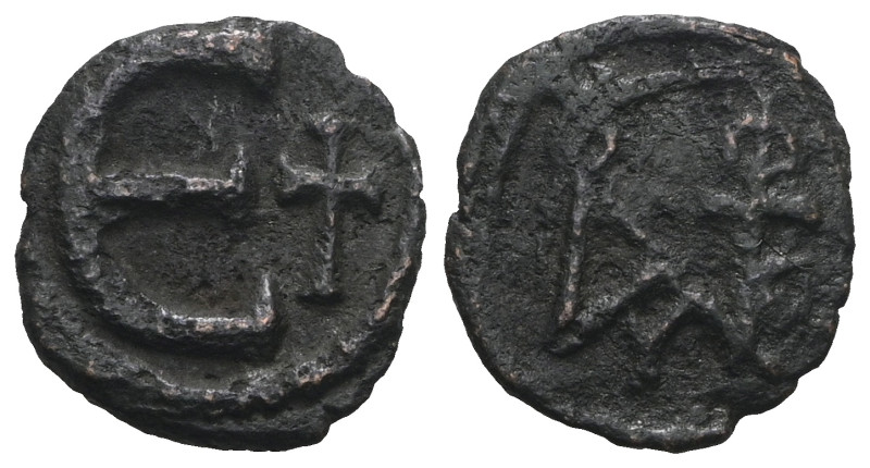 Byzantine bronze coin. Weight 1,17 gr - Diameter 12 mm.