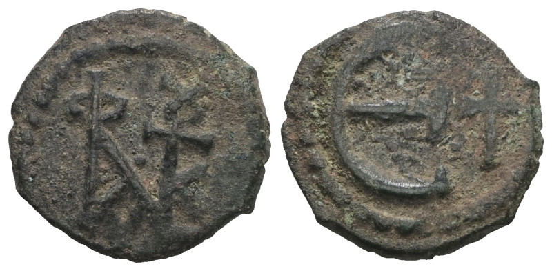 Byzantine bronze coin. Artificial sandpatina. Weight 1,57 gr - Diameter 13 mm.