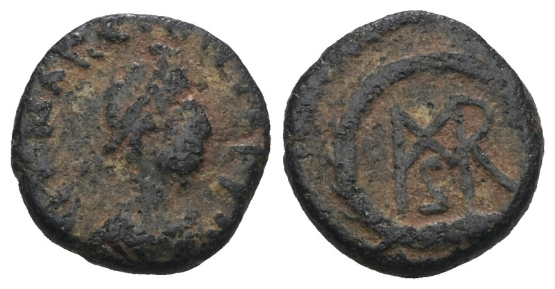 Byzantine bronze coin. Artificial sandpatina. Weight 1,20 gr - Diameter 10 mm.