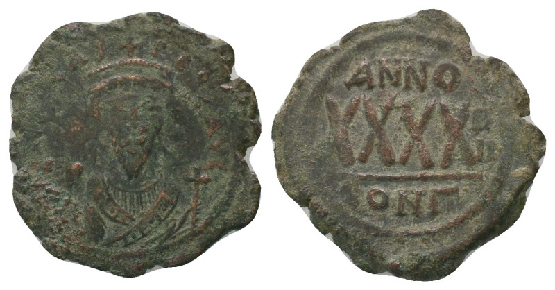 Phocas Follis. AD. 602-610. Constantinople. AE. Weight: 10.55 g
Diameter: 29.68...