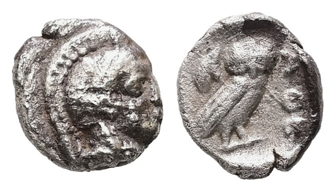 Attica, Athens. AR Hemiobol, 0.31 g 7.42 mm. Circa 454-404 BC.
Obv: Helmeted hea...