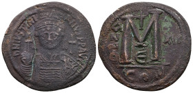 Justinian I, AD 527-565. AE, Follis. 20.37 g. 41.09 mm. Constantinople.
(broken and repaired)