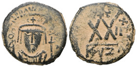 Phocas, AD 602-610. AE, Half Follis. 5.91 g. 22.52 mm. Cyzicus.
Obv: Crowned with pendilia, mantled bust facing.
Rev: Large XX, star above; KYZ.
Re...