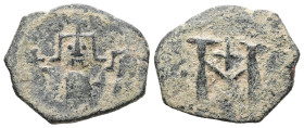 AE, Follis. 3.03 g. 21.37 mm. 
Obv: Crowned facing bust.
Rev: Large M with cross above.
Fine.