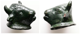 Roman bronze appliqué in the shape of a bull's head (AD 1st–3rd centuries)
Weight: 53.99 g.
Diameter: 48.10 mm.