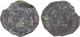 SOGDIANA: Unknown issuer, probably 6th/7th century, AE unit (0.98g), crude bust (facing?), stylized Sogdian legend around // large anchor-style tamgha...