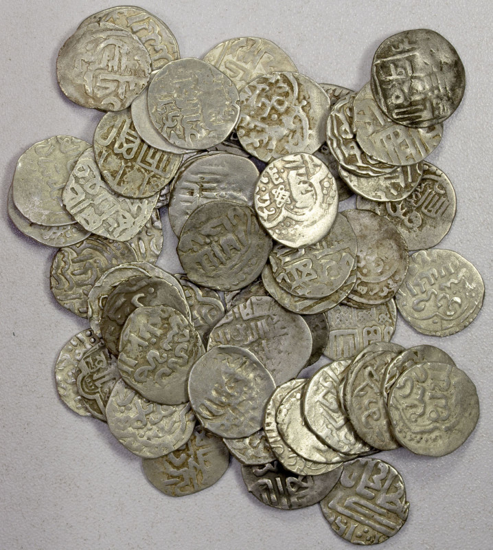 GOLDEN HORDE: LOT of 57 silver dirhams, including examples of Uzbek Khan, Jani B...