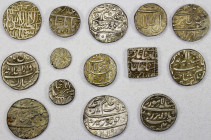 MUGHAL: LOT of 14 silver coins (rupee unless noted), including Akbar (4 pcs, two rupees and one mahmudi and one half mahmudi of Mulher); Jahangir (4, ...