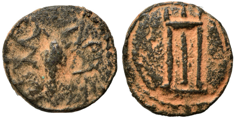 Greek. Ae (bronze, 1.29 g, 12 mm). Club, legend around. Rev. Tripod. Repatinated...