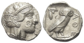 Attika. Athen.

 Tetradrachme (Silber). Ca. 454 - 404 v. Chr.
Vs: Kopf der Athena mit ölzweiggeschmücktem attischem Helm, Ohranhänger und Halskette...