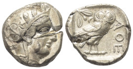 Attika. Athen.

 Tetradrachme (Silber). Ca. 454 - 404 v. Chr.
Vs: Kopf der Athena mit ölzweiggeschmücktem attischem Helm, Ohranhänger und Halskette...