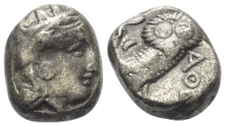 Attika. Athen.

 Tetradrachme (Silber). Ca. 353 - 294 v. Chr.
Vs: Kopf der Athena mit ölzweiggeschmücktem attischem Helm, Ohranhänger und Halskette...