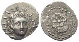 Inseln vor Karien. Rhodos.

 Drachme (Silber). Ca. 84 - 30 v. Chr.
Vs: Kopf des Helios mit Strahlenkrone in Dreiviertelansicht rechts.
Rs: Rosenbl...