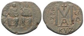 Iustinus II. (565 - 578 n. Chr.).

 Follis (40 Nummi, Bronze). 574 / 575 n. Chr. (Jahr 10). Kyzikos.
Vs: Iustinus mit Kreuzglobus und Sophia mit Kr...