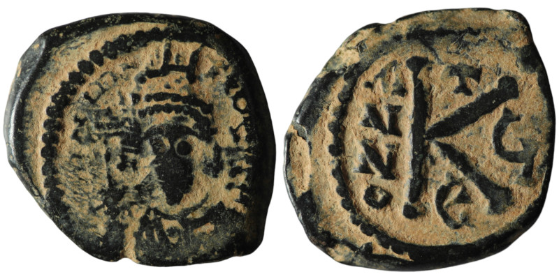 Maurice Tiberius (AD 582-602). Constantinople. dated RY 6 = 587/8
AE Half Follis...