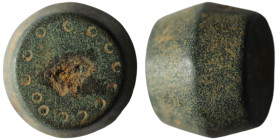 Roman coin weight made of bronze, with ring punches. Dated to the 4th century AD.
AE Bronze (15mm, 58,00g)