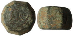 Roman-Byzantine coin weight made of bronze with decoration.
AE Bronze (10mm, 27,53g)