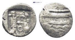 Phoenicia, Sidon AR 1/16 Shekel. (10mm, 0.6 g) Ba`alšillem (Sakton) II, circa 401-365 BC. Persian king or hero, holding dagger in right hand, standing...