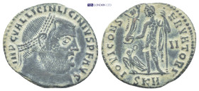 Licinius I AD 308-324. Cyzicus Follis Æ (22mm., 2.9 g). IMP C VAL LICIN LICINIVS P F AVG, laureate head right / IOVI CONSERVATORI, Jupiter standing le...