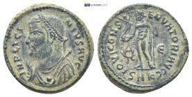 Licinius I. Æ Follis (17mm, 3.6 g). Cyzicus mint. Struck AD 317-320. Laureate bust left, wearing imperial mantle, holding mappa, globe, and scepter / ...