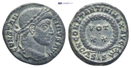 Constantine I Æ Nummus. (18mm, 2.9 g) Siscia, AD 321-324. CONSTANTINVS AVG, laureate head right / D N CONSTANTINI MAX AVG, VOT XX within wreath; ΔSIS(...