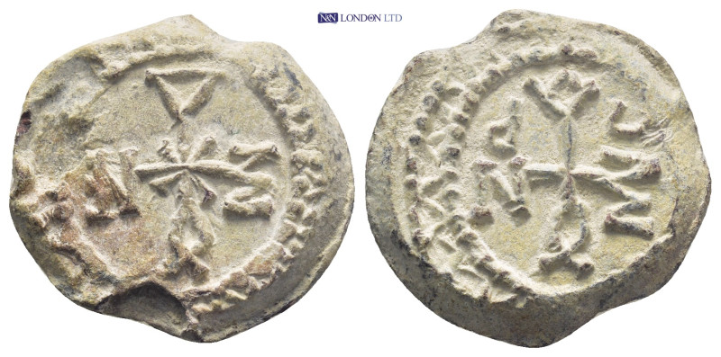 Byzantine Lead Seal, (22mm, 12.0 g) Cruciform monogram. / Cruciform monogram.