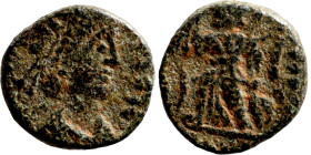 Antik coin bronze

9mm 0,92g