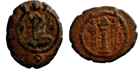 Antik coin

13mm 0,65g