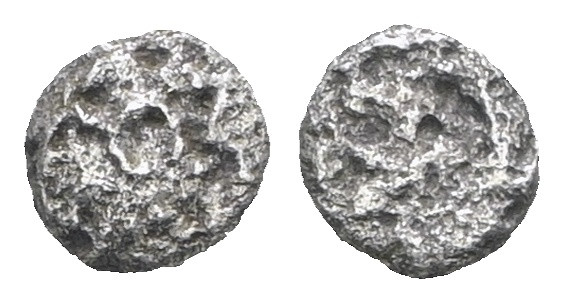 Greek uncertain AR. Weight 0,11 gr - Diameter 3 mm.