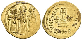 Heraclius, with Heraclius Constantine and Heraclonas. 610-641. AV Solidus. Constantinople mint. Heraclonas, Heraclius, and Heraclius Constantine stand...