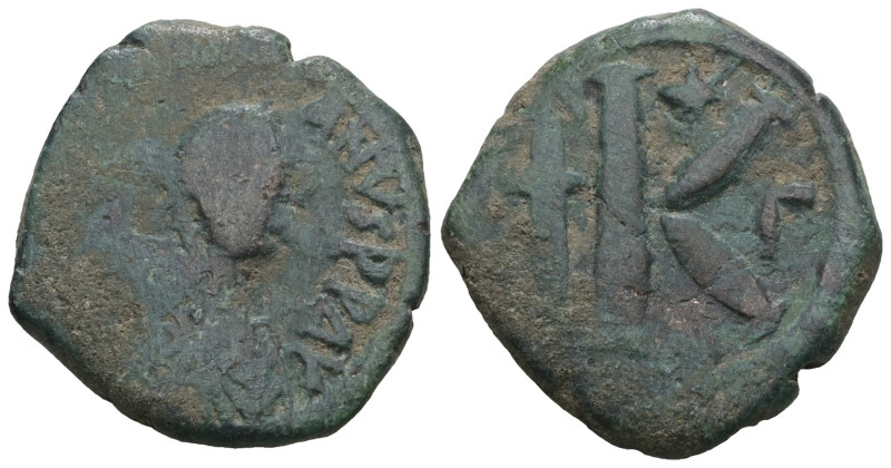 JUSTINIAN I. 527-565 AD. Æ Half Follis. Weight 8,68 gr - Diameter 22 mm.