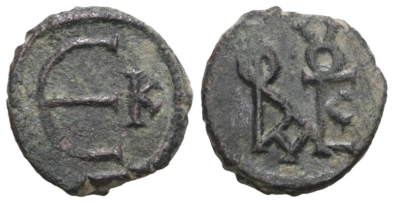 Byzantine bronze coin. Weight 1,64 gr - Diameter 12 mm.