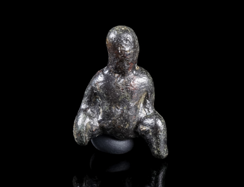 A ROMAN BRONZE FIGURAL AMULET PENDANT
Circa 2nd-3rd century AD.
Pendant in the...