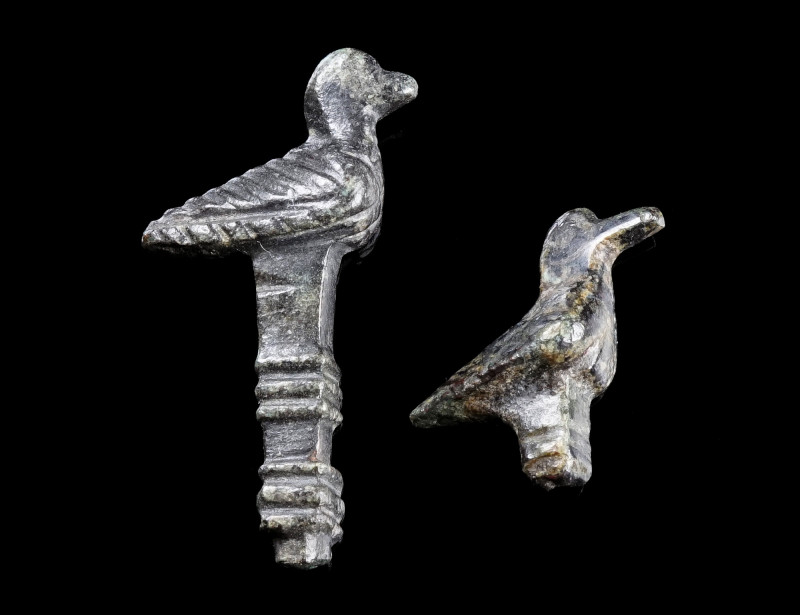 TWO BYZANTINE BRONZE BIRD FIGURES
Circa 5th-7th century AD.
Two bird-shaped te...