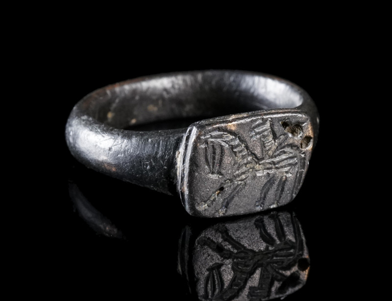 A BYZANTINE / MEDIEVAL BRONZE RING WITH A HORSEMAN
Circa 10th-13th century AD....