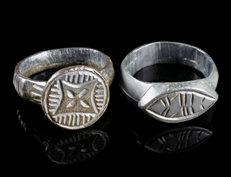 TWO LATE MEDIEVAL / EARLY MODERN BRONZE RINGS
Circa 15th-16th century AD.
One ...