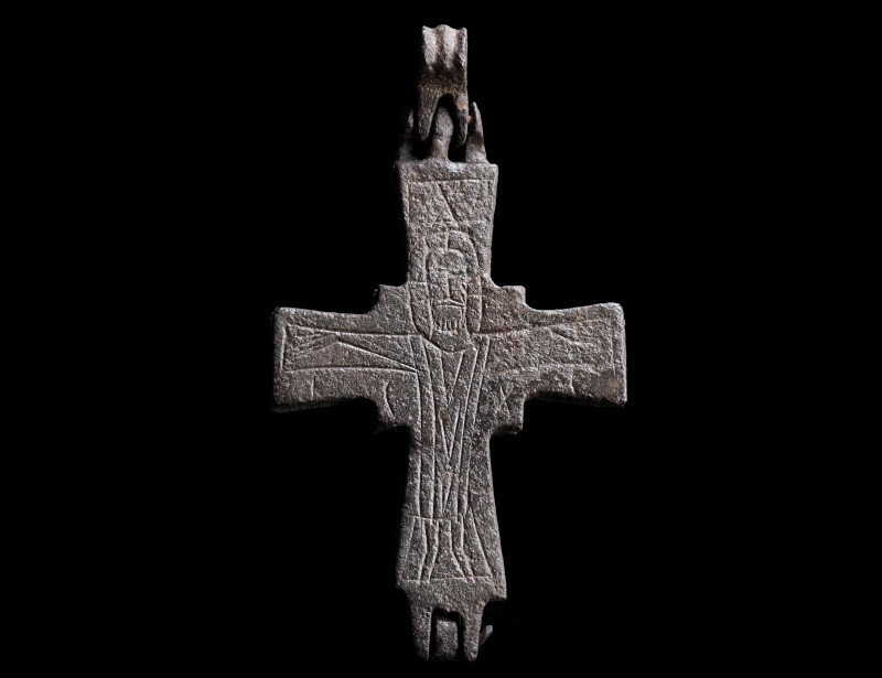 A BYZANTINE BRONZE RELIQUARY CROSS WITH CHRIST AND MARY
Circa 10th-12th century...