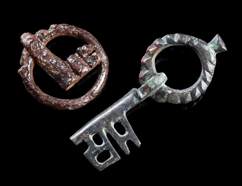 TWO BYZANTINE FOLDING KEYS
Circa 5th-6th century AD.
A bronze folding key with...