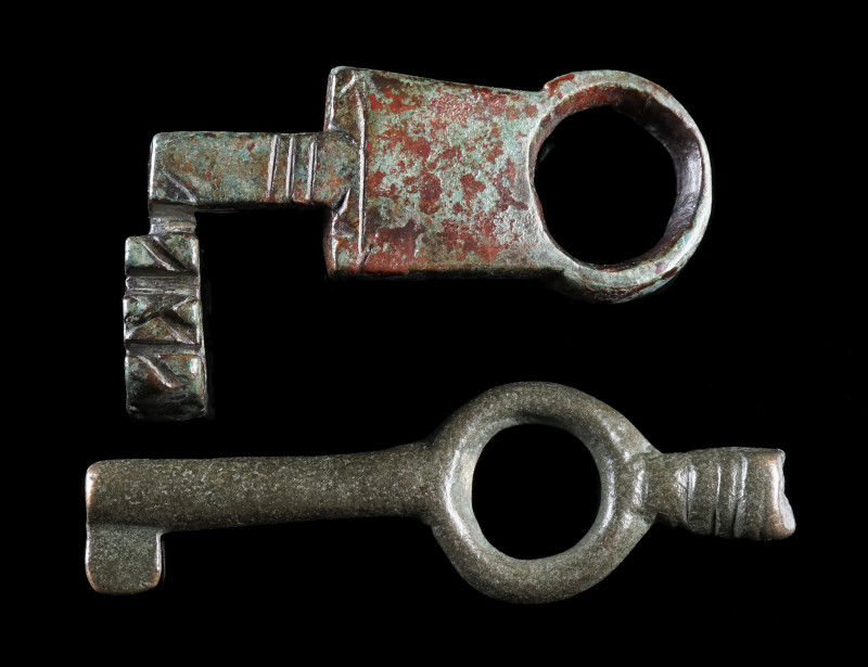 TWO ROMAN BRONZE KEYS
Circa 1st-4th century AD.
One with a handle with loop an...