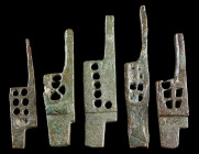 A GROUP OF FIVE ROMAN BRONZE CHEST-LOCK BOLTS
Circa 1st-3rd century AD.
The holes would have matched up to the teeth of a key, allowing to release t...