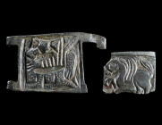 TWO BRONZE BELT BUCKLES WITH FIGURES
Circa 9th-11th century AD.
Byzantine / First Bulgarian Empire. Square plates of belt buckles with a stylised gr...