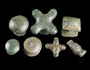 A GROUP OF SEVEN ROMAN BRONZE BELT STUDS/MOUNTS
Circa 2nd-3rd century AD.
Various forms and types, some decorated.
Diameter 12-27 mm

Ex European...