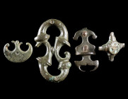 A GROUP OF FOUR ROMAN BRONZE BELT FITTINGS
Circa 2nd-3rd century AD.
Various forms and types (Romano-Celtic 'Trumpet-style', Pelta, enamelled).
L 1...