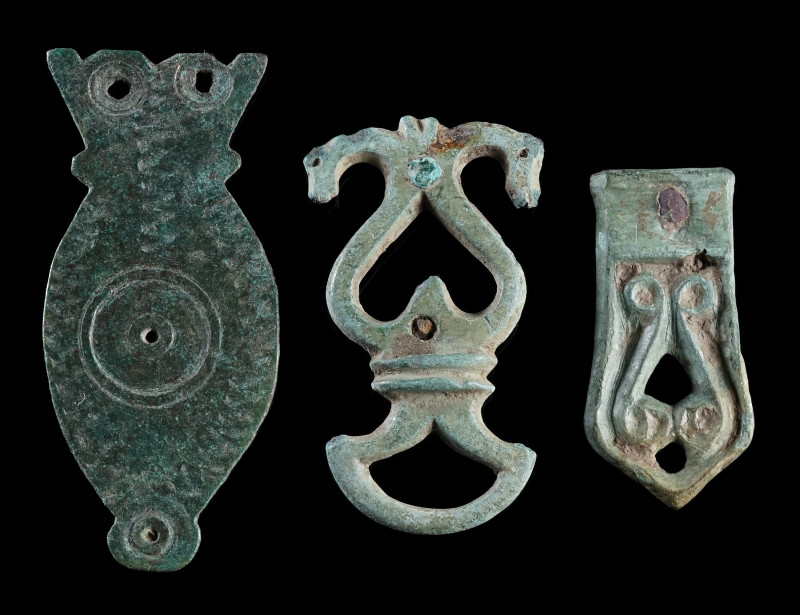 THREE LATE ANTIQUE / EARLY MEDIEVAL BRONZE BELT FITTINGS
Circa 3rd-8th century ...