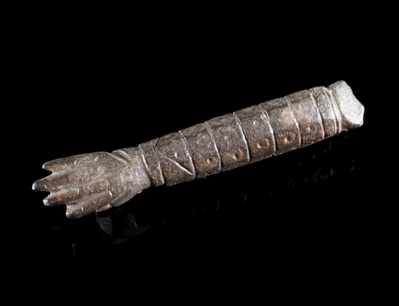 A ROMAN BRONZE KNIFE HANDLE IN THE SHAPE OF AN ARM
Circa 1st-3rd century AD.
K...