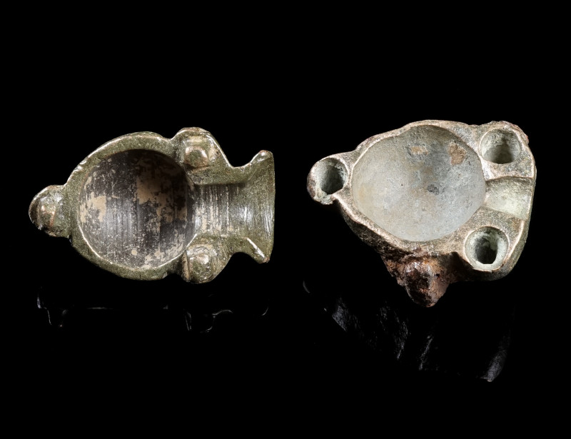 TWO BRONZE HALVES OF BULLET MOULDS
Circa 17th-19th century AD.
Two (not matchi...